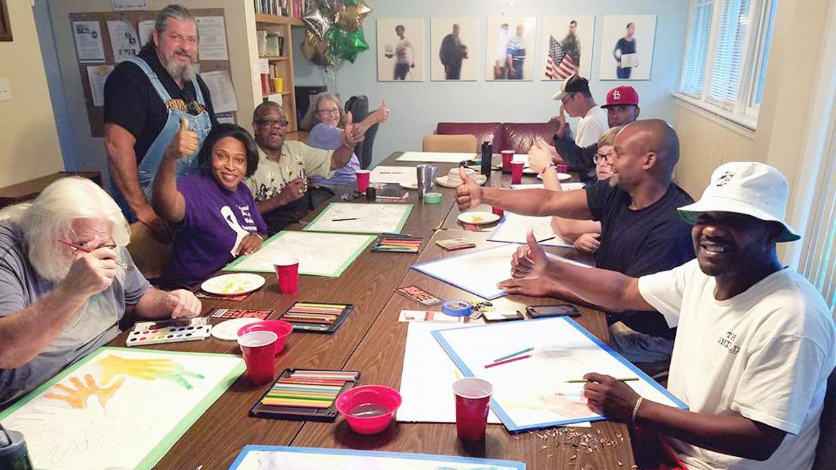 Group of residents sitting around a table
